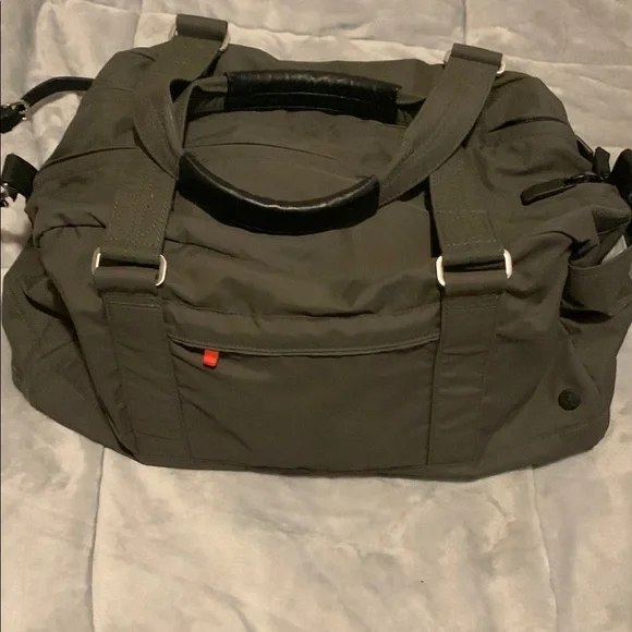 Lululemon green dufflebag vinyl with black leather handles 18in long - Picture 1 of 13